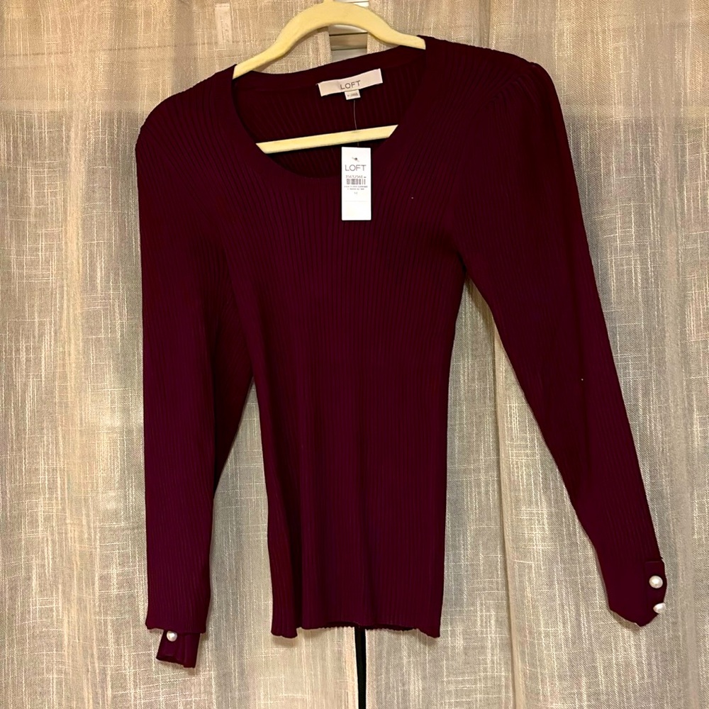 Cute sweater with pearl buttons
